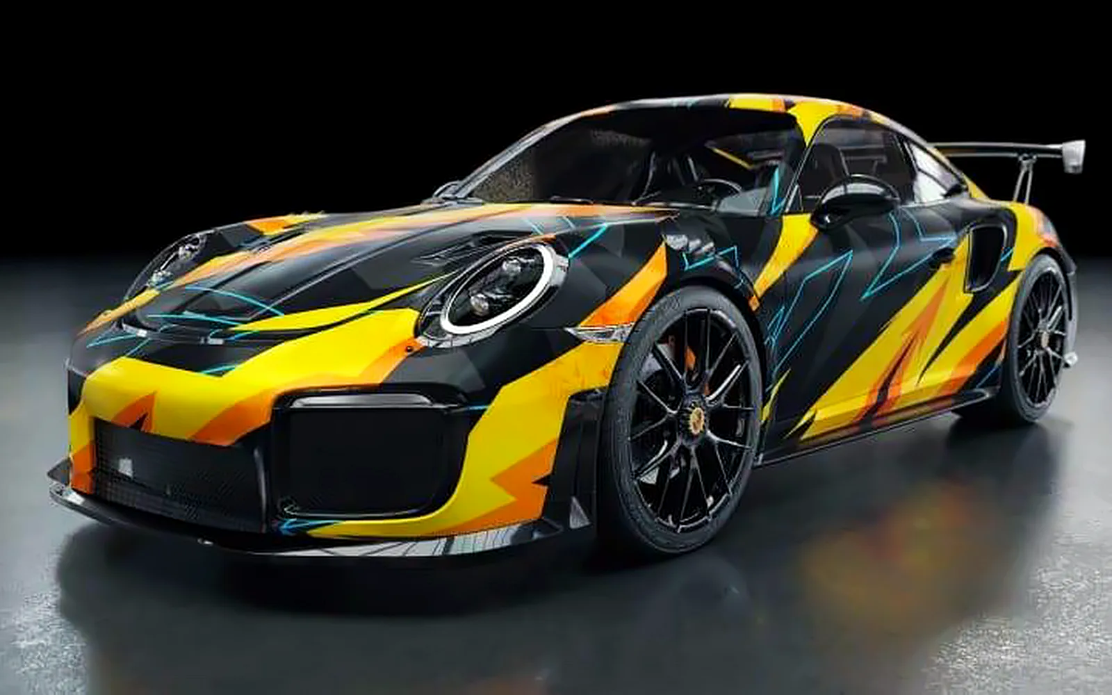Qué es el car wrapping y cómo funciona el vinilado de coches 1 Porsche 911 con vinilo de diseño en amarillo, negro y azul, un ejemplo de qué es el car wrapping